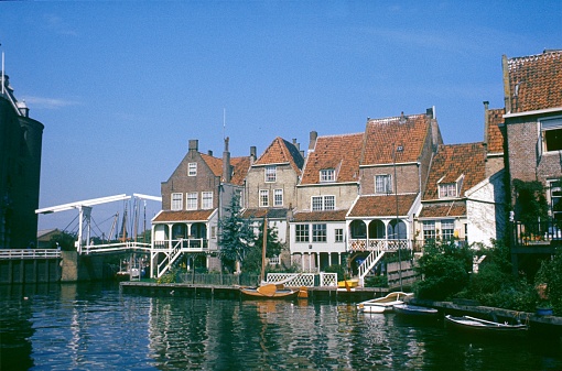 Nord Holland, Netherlands, 1977. Houses along a canal in the town of Enkhuizen.