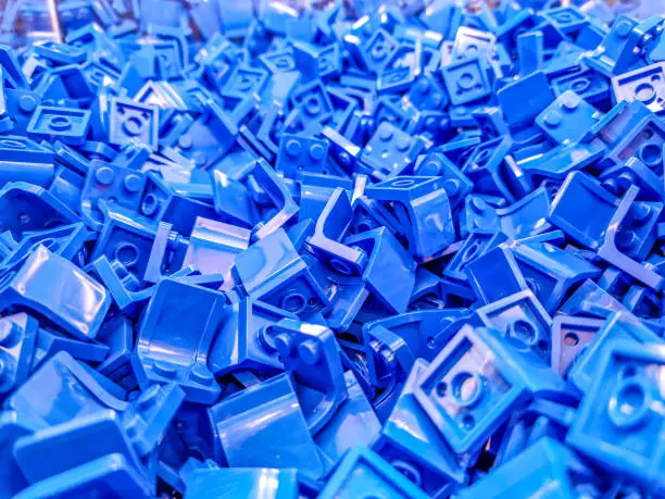Many blue plastic blocks together