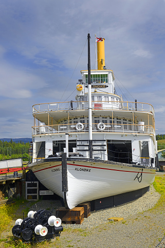 Klondike SS Sternwheel steamboat, picture of boat on bank of the river Yukon in Whitehorse – National historic site, Canada