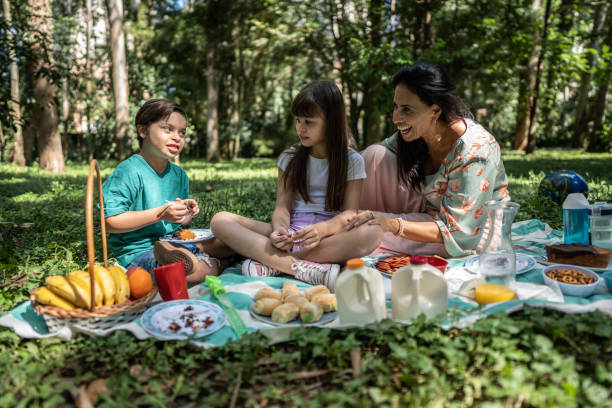istock Family doing a picnic at the park 1483137730