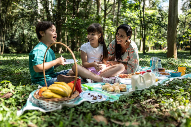 istock Family doing a picnic at the park 1483137744