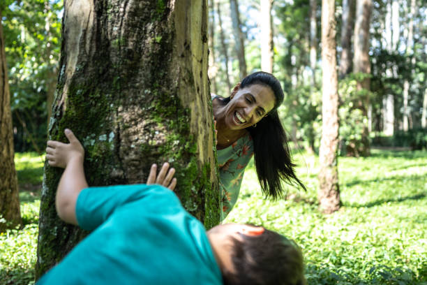 istock Mother playing with her son at the park 1483137745