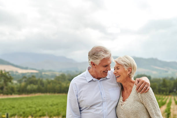 istock Happy senior couple hugging in vineyard 1483138406