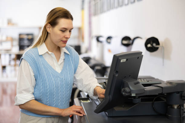 istock Woman working in publishing facility 1483141355