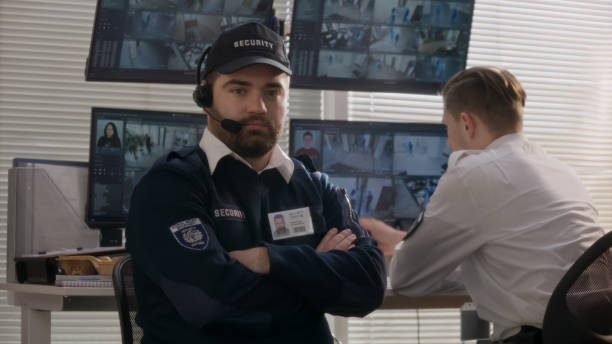 istock Security officer in headset looks at camera 1483142369
