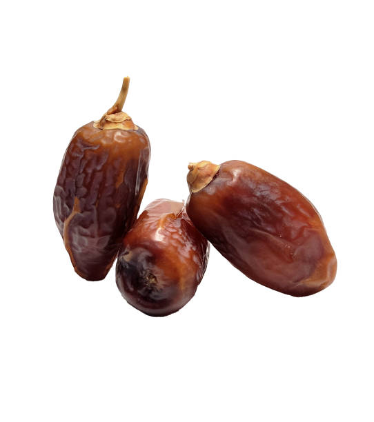 istock Close up of dried dates fruit isolated on white background 1483143172