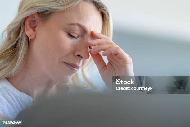 Upset Stressed Mature Woman Close Up Stock Photo - Download Image Now - Headache, Menopause, Women