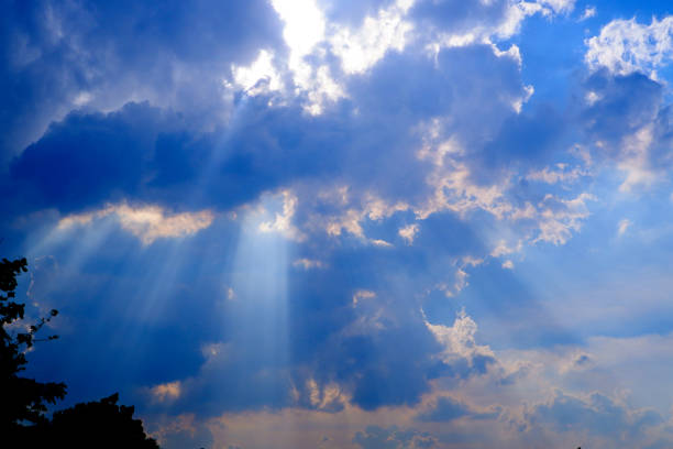 sun ray light through cloud on blue sky : can be used as background and dramatic look