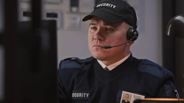 istock Busy security worker talks with coworker by walkie talkie 1483147120