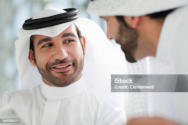 Close Up Of Businessmen In Kaffiyehs Stock Photo - Download Image Now - 25-29 Years, Adult, Adults Only