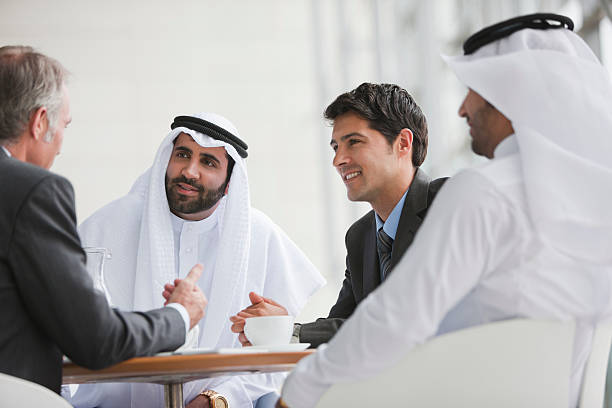 Businessmen talking in meeting  middle eastern culture photos stock pictures, royalty-free photos & images