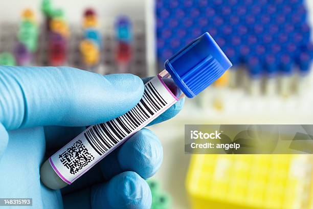 Hand Holding A Tube Of Blood Stock Photo - Download Image Now - Label, Laboratory, Bar Code