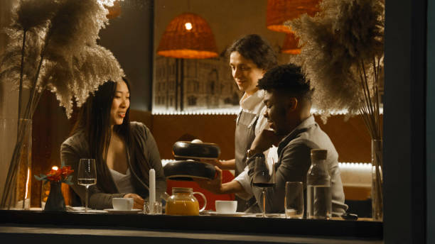 istock Multi ethnic couple on a date in modern cafe 1483155363