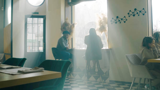 istock Waitress brings gourmet dishes to guests 1483162598