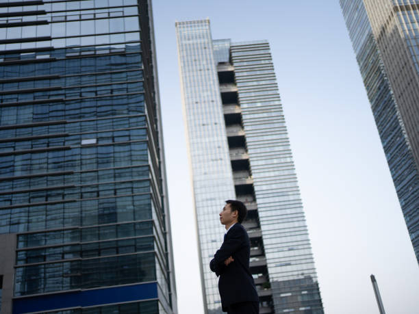 istock Business Elite: Successful Men Outside Office Buildings 1483164129