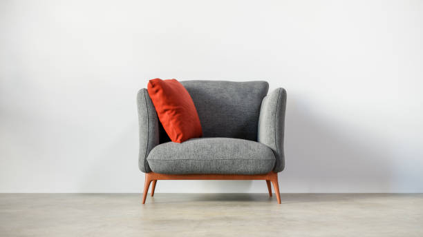 istock Front view of a 1-seater gray fabric sofa with a white wall behind it. 3d rendering 1483166667