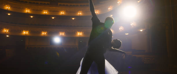 istock Ballet dancers practice ballet lifts on theater stage 1483170779