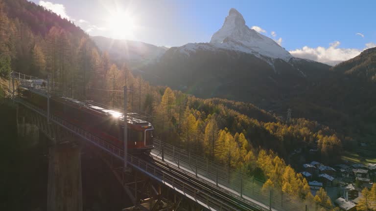 Matterhorn with railroad and train, Switzerland.