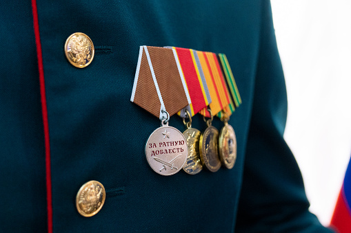 Moscow, Russia - March 31, 2023 Orders on the chest of the Russian military during the parade. Medal for military valor.