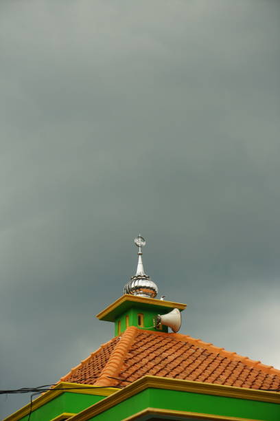 istock Minaret of mosque down view on a cloudy day 1483172324