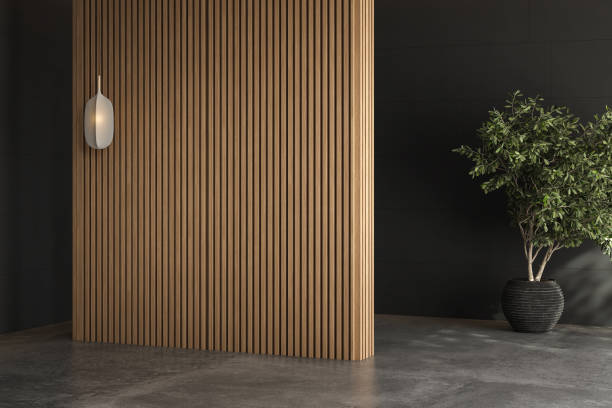 istock Empty room with concrete floor, wood and wall background, plant, lamp, sun rays, front view, space for mock up. 3d Rendering 1483175295