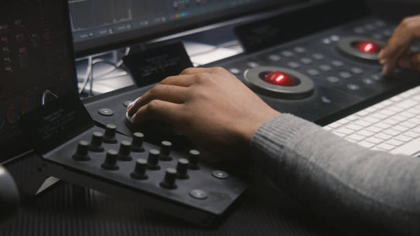 Video editor work by color grading control panel stock photo