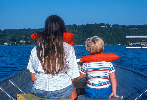 Lake of the Ozarks - Sister & Brother in Fishing Boat - 1991. Scanned from Kodachrome 64 slide.