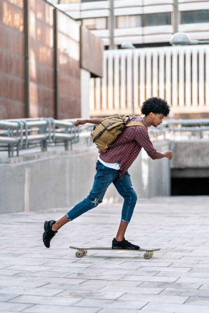 istock Skater Boy Practicing in the City 1483185733