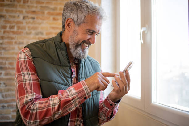 istock Portrait of a senior man using smartphone 1483197410