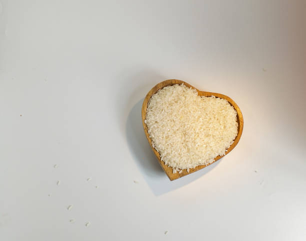 istock rice in a heart-shaped wooden 1483197825