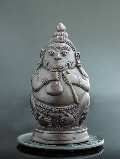 istock Figurine of Phali, (The Unbeatable Money King) Sculpture Statue on Dark Background. 1483199054