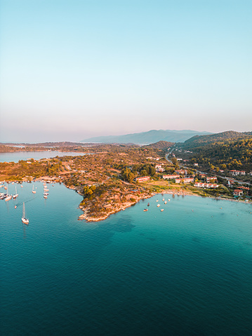 Drone shot of a beautiful harbour at sunrise in Halkidiki, Greece