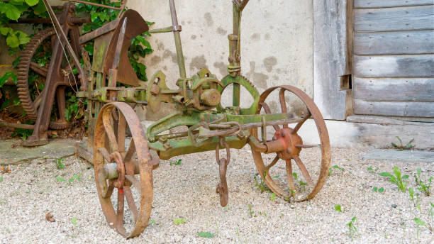 istock Rusty discarded machines in the backyard of a farmhouse 1483202084