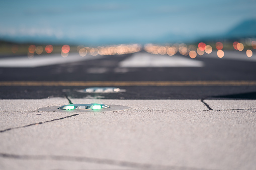 Green light on the airports runway.