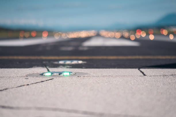 Green Light On The Airports Runway Green light on the airports runway. taxiway stock pictures, royalty-free photos & images