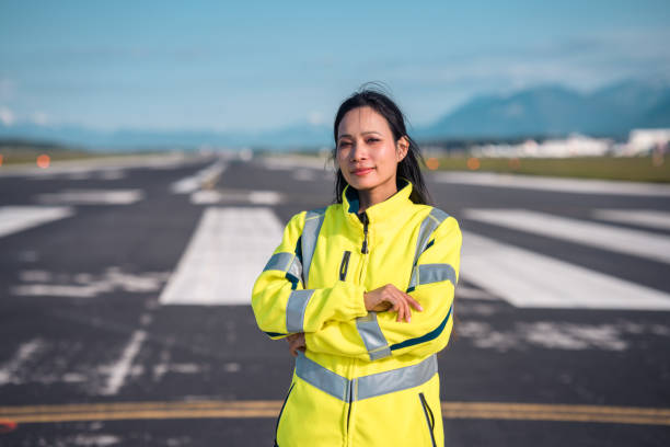 istock Asian Female Airfield Operations Officer On A Runway 1483202642