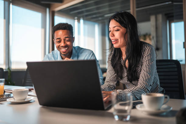istock Smart Business Woman and Man Discussing Ideas 1483203156