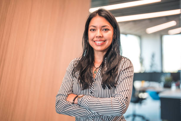 istock Female Employee Smiling and Exuding Confidence 1483203166