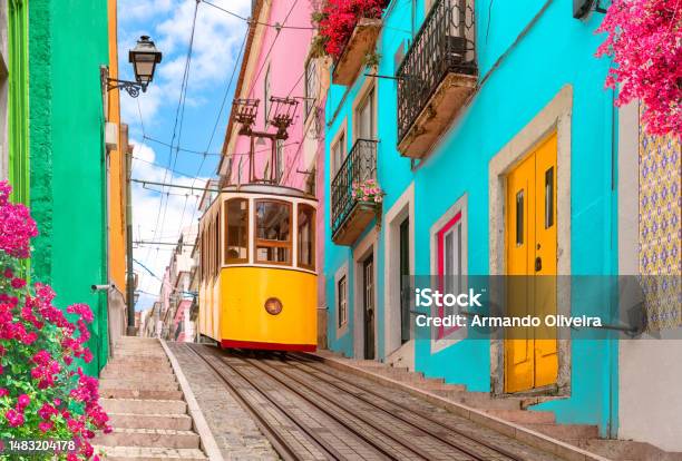 Yellow Typical Tram In Lisbon Portugal Stock Photo - Download Image Now - Lisbon - Portugal, Portugal, Cable Car