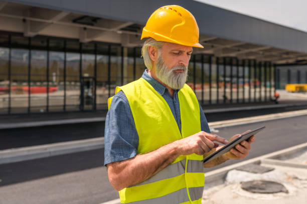 istock Mature Caucasian Male Engineer Working In A Construction Site 1483204241