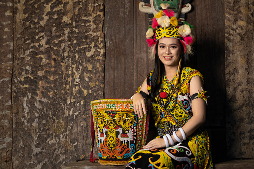 Exquisite elegance in traditional attire: A Borneo lady showcasing the beauty of her culture through her stunning traditional clothing