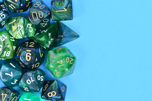 istock Different blue and green roleplaying RPG dice 1483204682