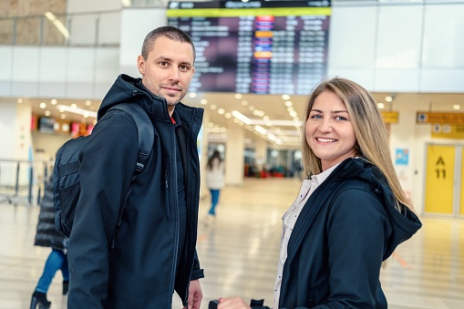 Young couple tourist at an international airport