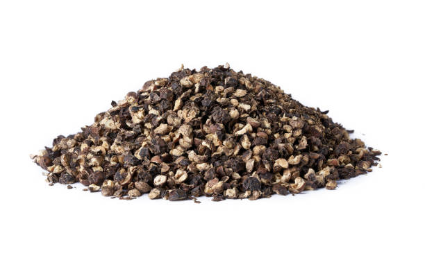 istock close up crushed black pepper isolated on white background with clipping path 1483212621
