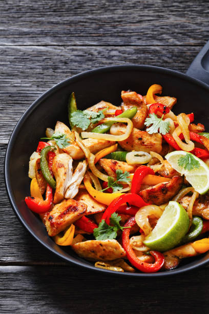 istock chicken fajitas with bell peppers, onion, spices 1483213224