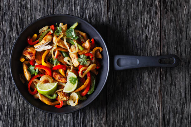 istock chicken fajitas with bell peppers, onion, spices 1483213225