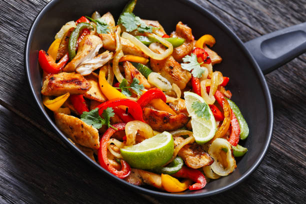 istock chicken fajitas with bell peppers, onion, spices 1483213227