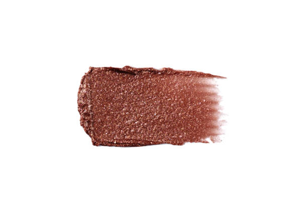 istock Wet bronzer, eye shadow smear isolated on white background. 1483214429