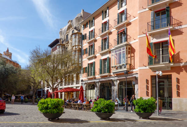 Palma, Spain - 30 March, 2023. Beautiful Square Place de  Cort in historic centre of Palma de Majorca, Spain