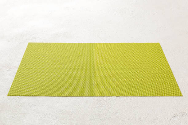 istock Perspective view of green tablecloth for food on cement background. Empty space for your design 1483220852